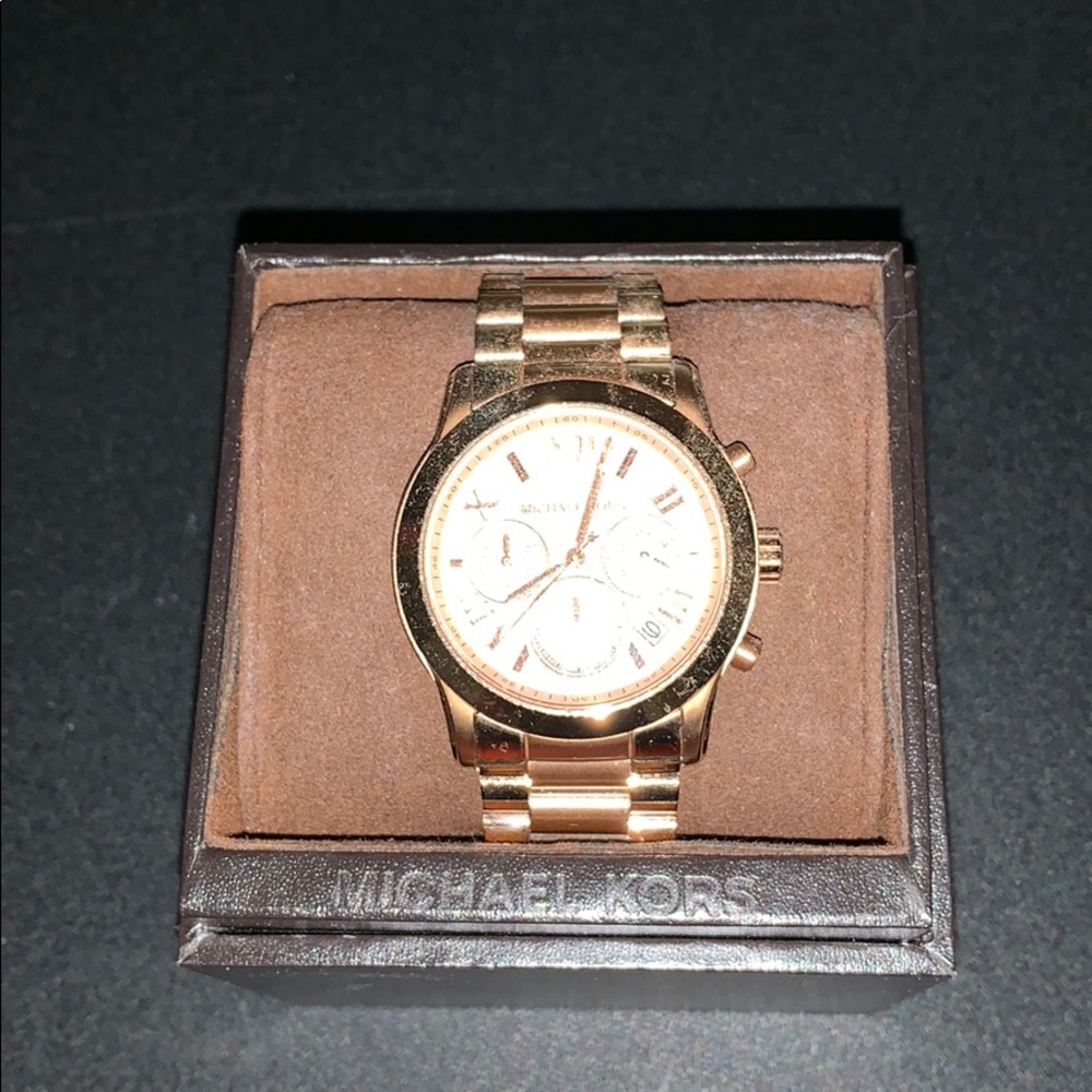 Gold MK watch